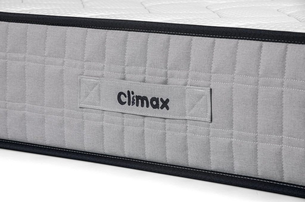 Climax Max Firm, lateral cinzenta com a pega e o logótipo