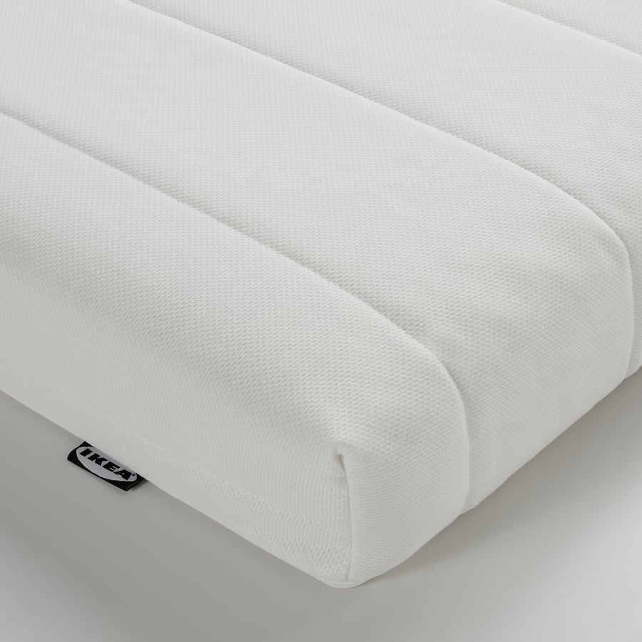 Pormenor da capa acolchoada do colchão IKEA ÅFJÄLL
