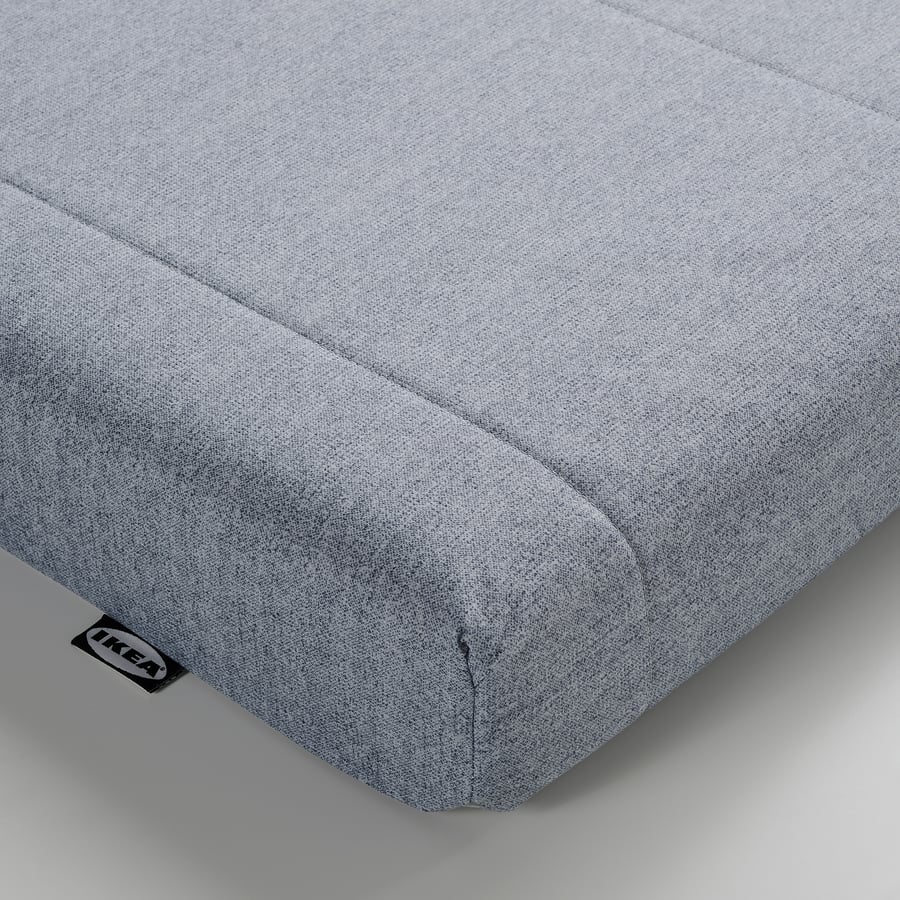 Pormenor da capa azul clara do colchão IKEA ÅGOTNES