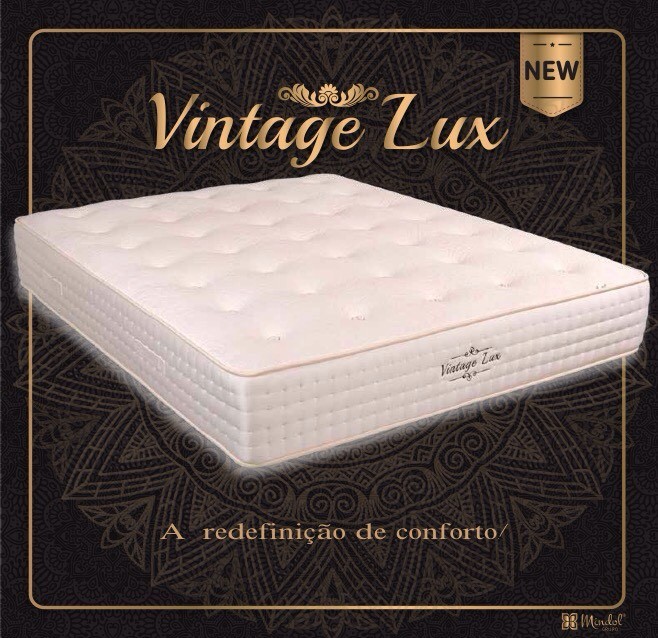 Colchão Mindol Vintage Lux sobre fundo escuro com o lema a redefinição de conforto